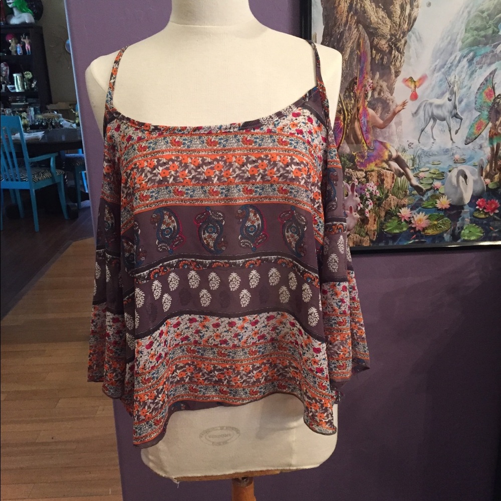 Top with open shoulders